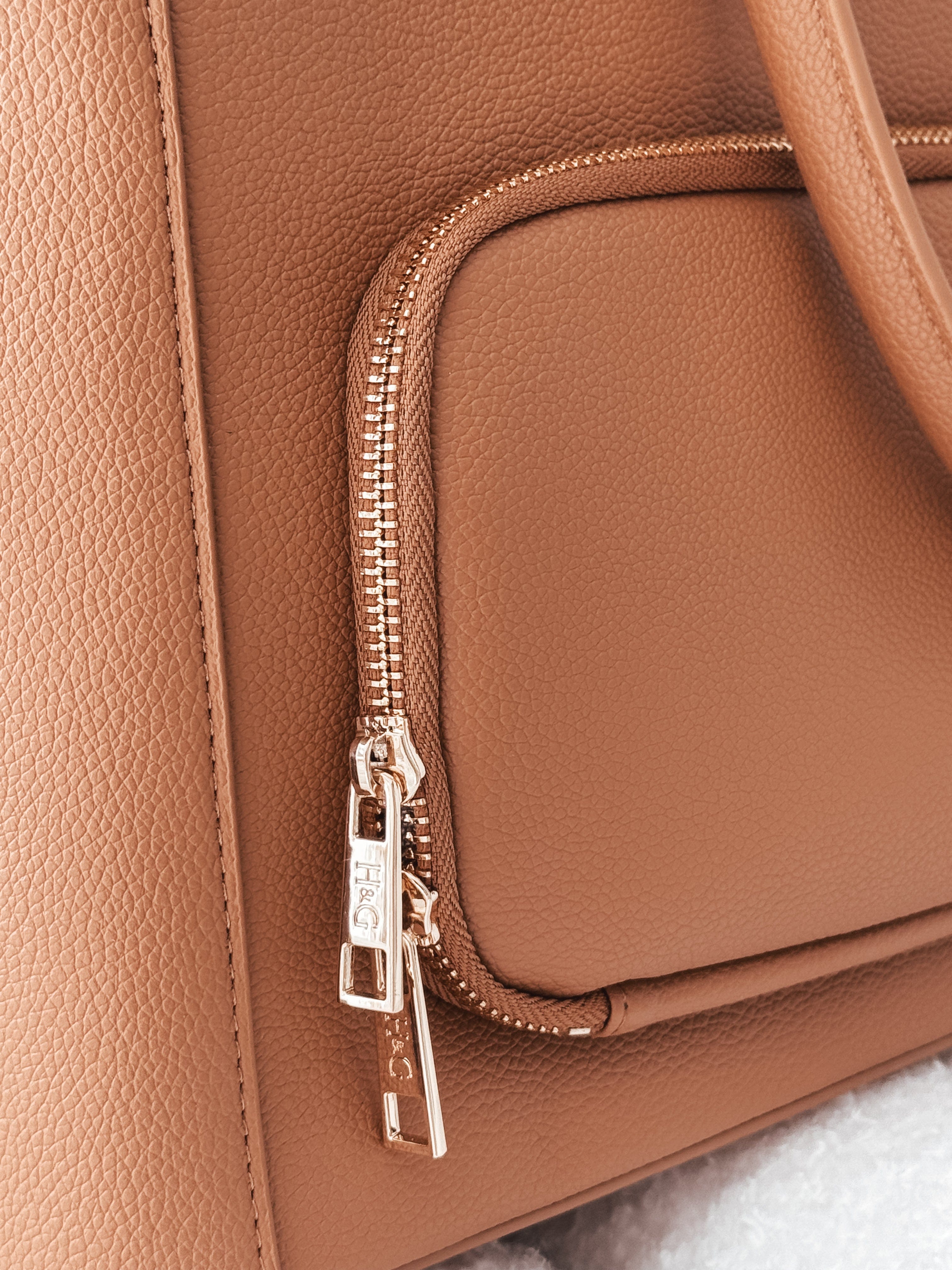 Gold Hardware with H & G logo