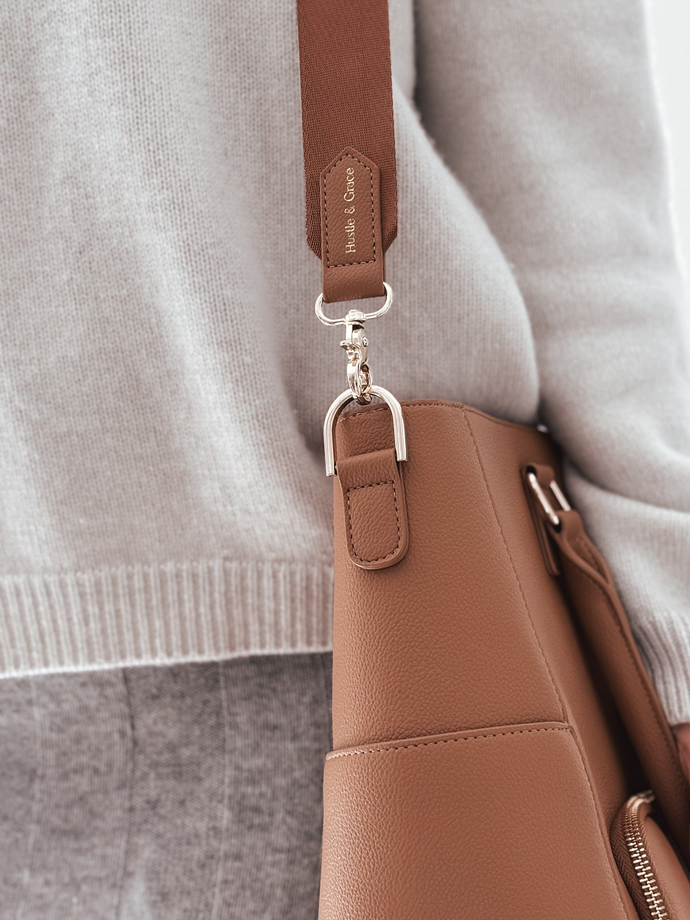 Embossed Gold  H & G Logo on Crossbody Strap