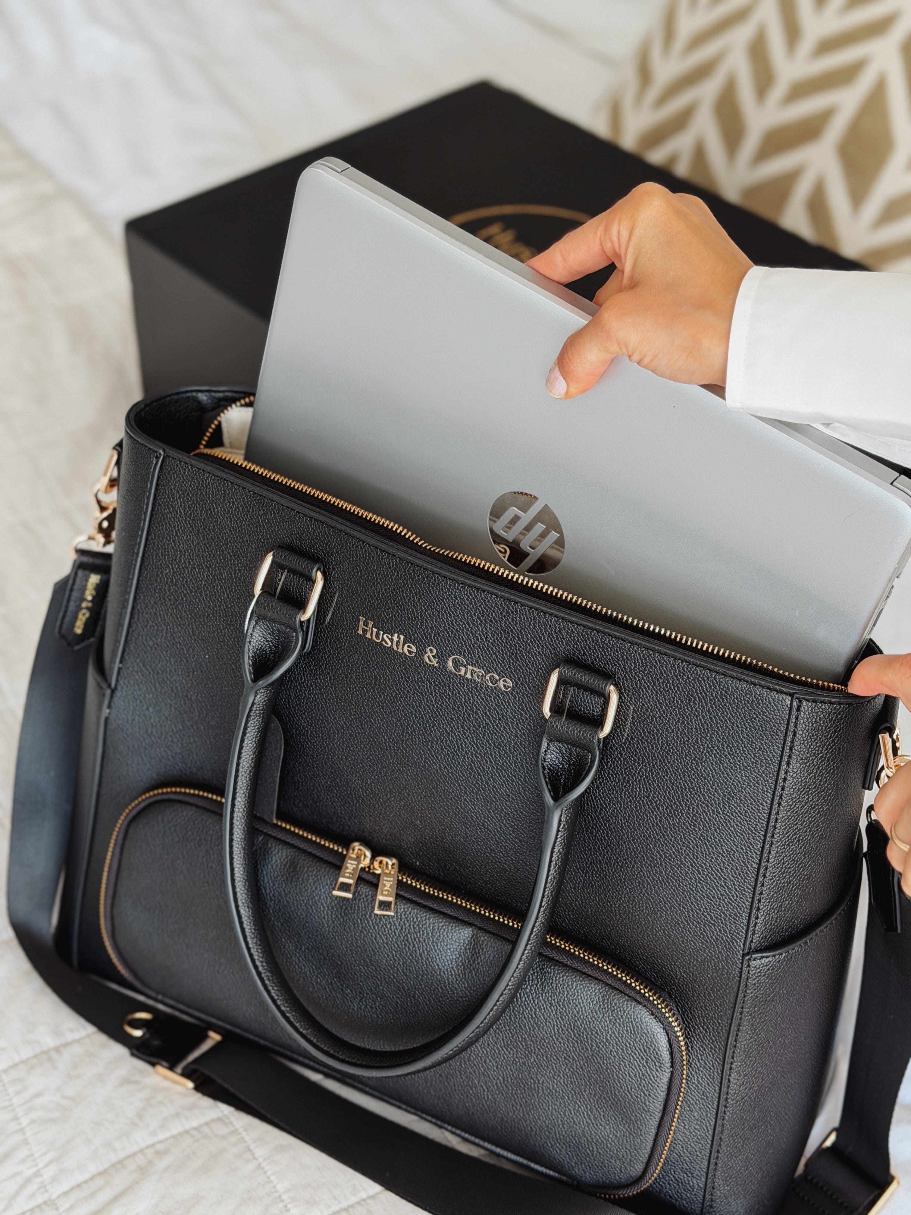 Padded laptop sleeve inside The Iluka Executive Tote — fits laptops up to 16 inches